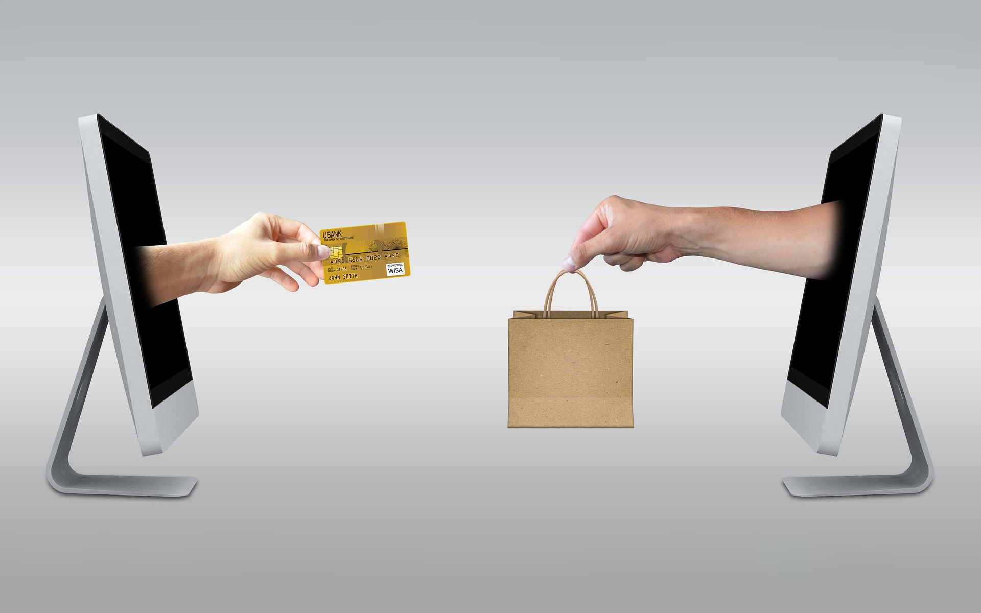Image showing 2 computers facing each other with forearms extending from each screen exchanging a credit card and a shopping bag